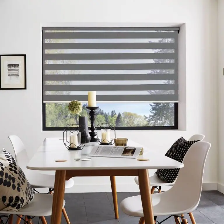 Anthracite grey vision blind partially open on a motorised track
