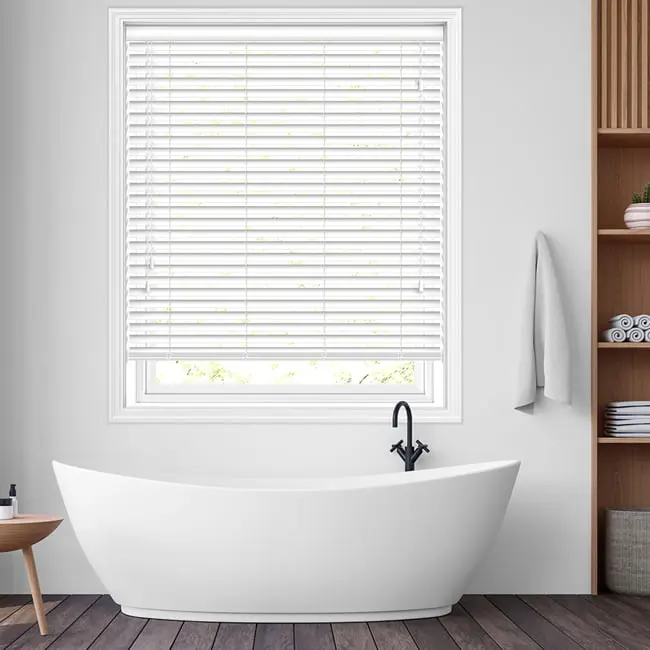 50mm brilliant white faux wood blinds fitted in a bathroom